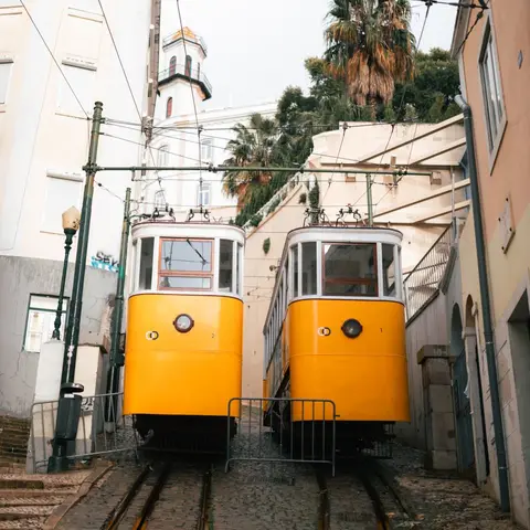A sunlit tiled street view of Lisbon